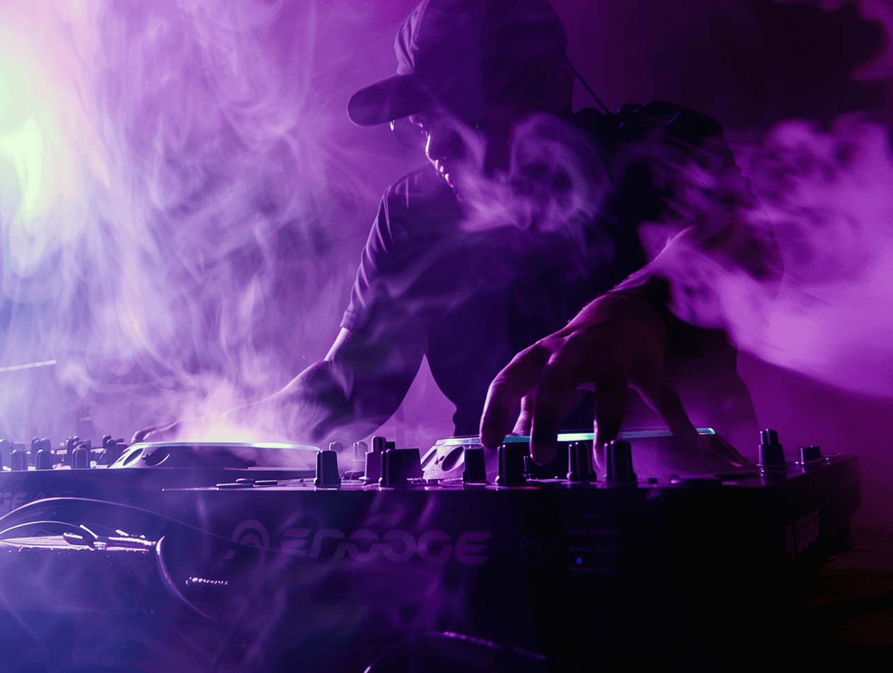 DJ mixing music on equipment, surrounded by purple smoke and dramatic lighting.